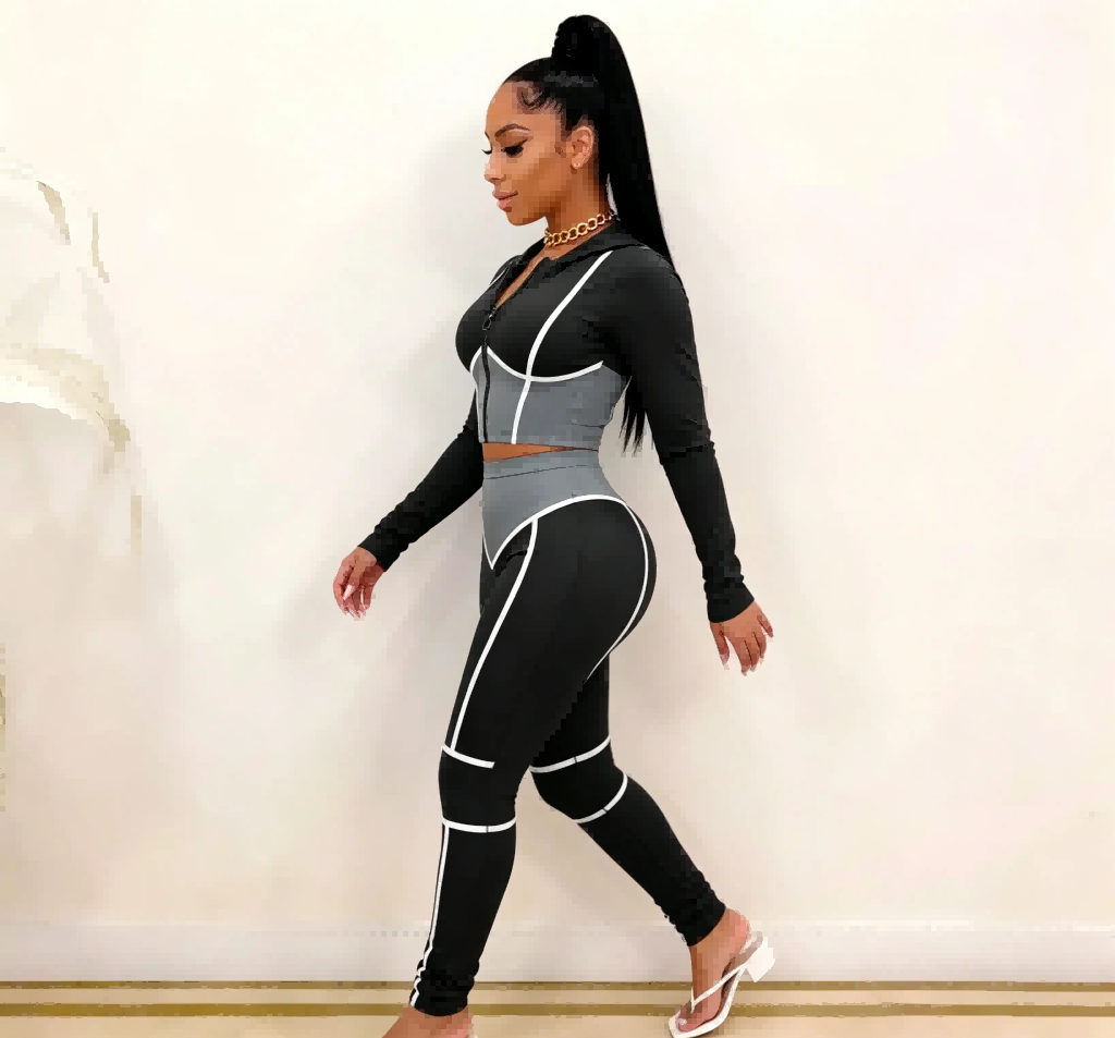 Side walking pose of fashion activewear set, white contrast piping detail for private label women’s fitness apparel
