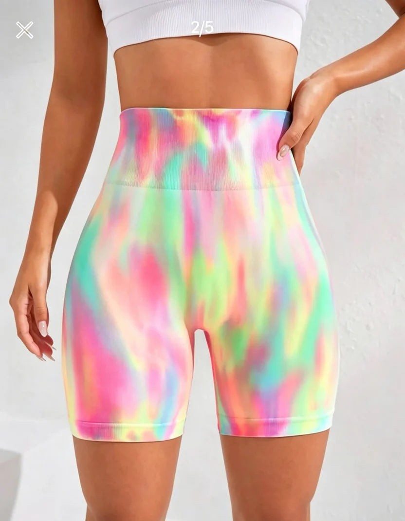 Full front standing stance of gradient tie dye women’s fitness shorts, anti-chafe thigh cut seamless fabric for private label activewear