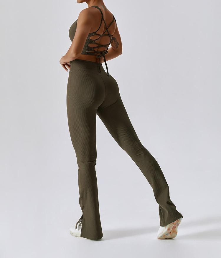Back side stance photo of lace-up back workout set, flowy split flare leg design for global custom fitness apparel
