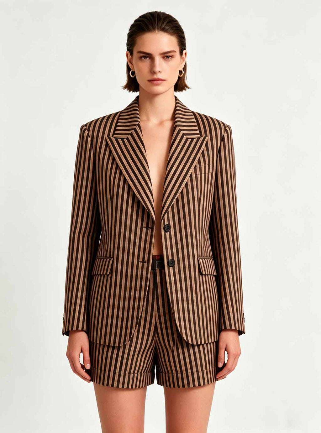 Haideyu women brown‑black vertical striped blazer and shorts 2‑piece suit, long‑sleeve lapel formal blazer and tailored shorts, OEM ODM custom women business clothing, white studio background product photo