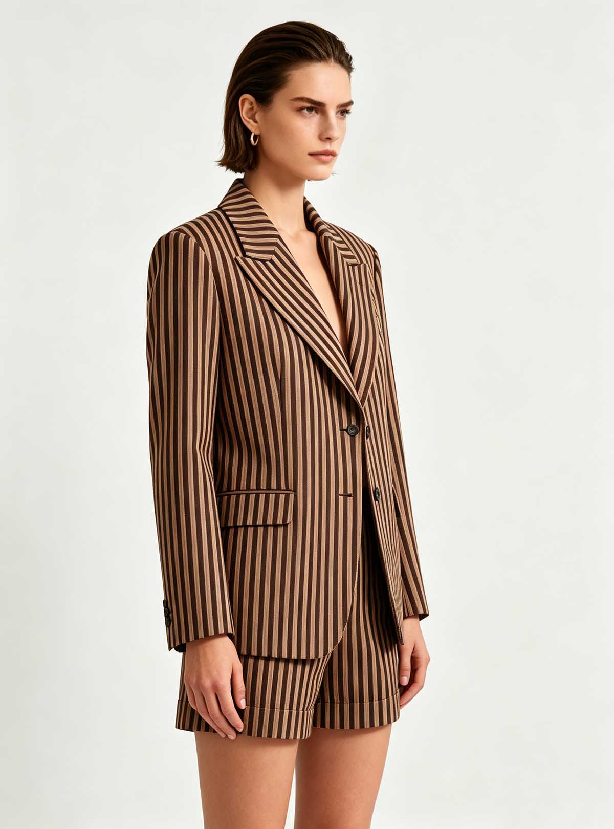 Haideyu women striped blazer and shorts two‑piece suit side profile, slim‑fit long‑sleeve blazer with high‑quality tailored shorts, custom‑made women fashion formal wear, clean white studio shot