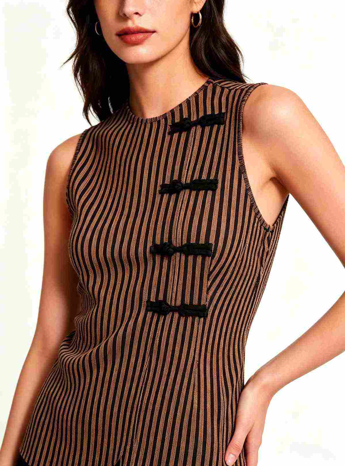 Haideyu women vertical stripe sleeveless top fabric detail view, close-up of stripe texture, neckline trim and black button detail, custom women fashion clothing, white studio background product photo