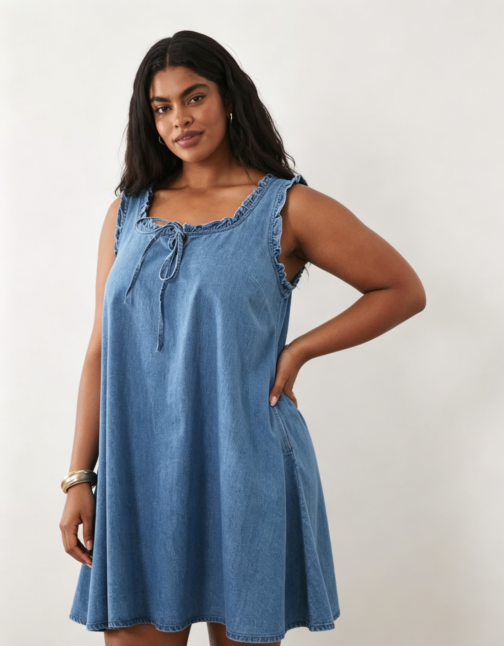 Hdfish Curve Denim Frill Detail Mini Dress, front view with hands in pockets, soft light-wash denim, plus-size casual swing dress, OEM/ODM custom, 50 MOQ, contact Hdfish88@outlook.com