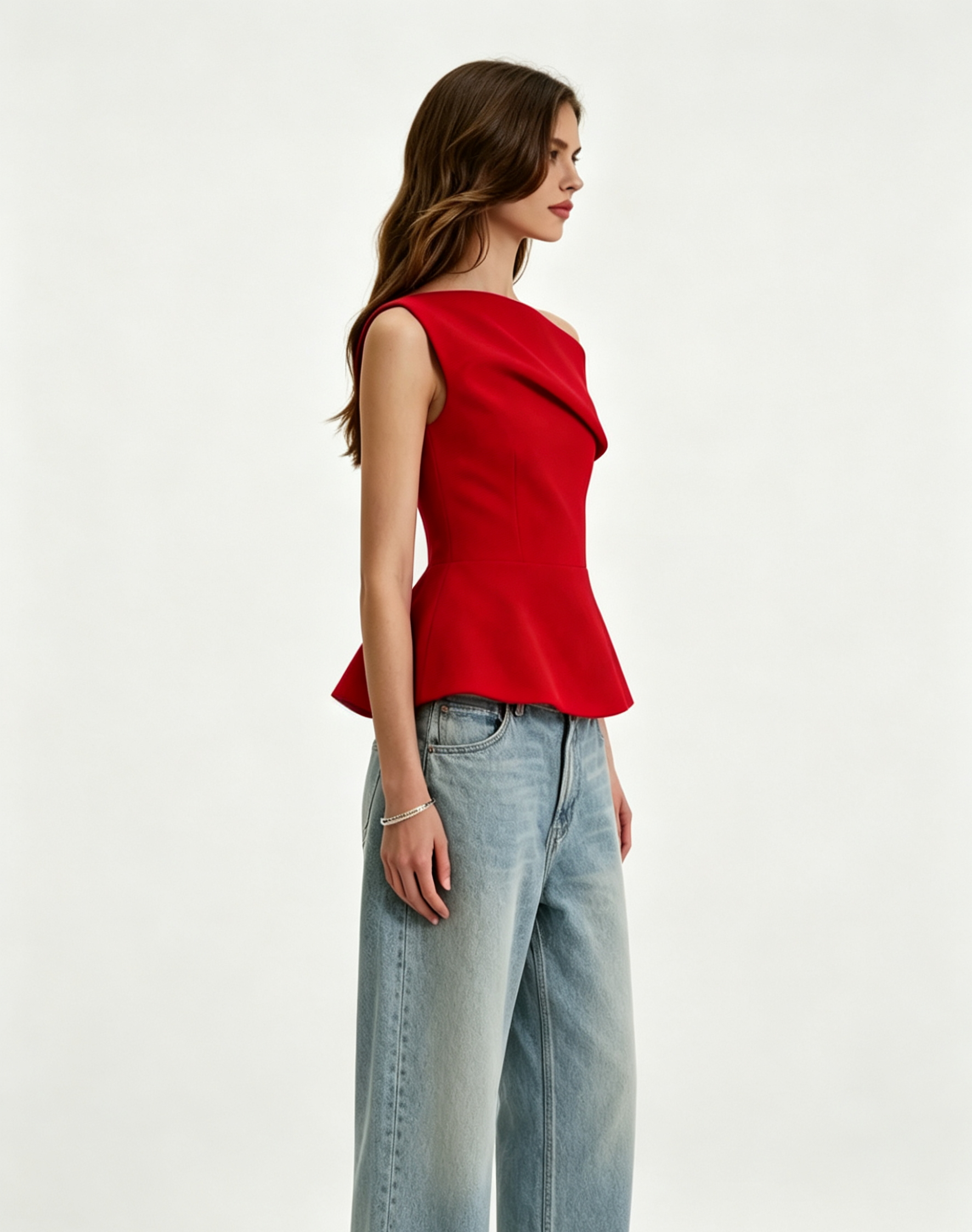 Haideyu bespoke structured red one shoulder peplum top side silhouette shot, sculptural draped neck design slim waist flared peplum hem, custom private label women formal casual blouse, blank transparent background fashion apparel photography
