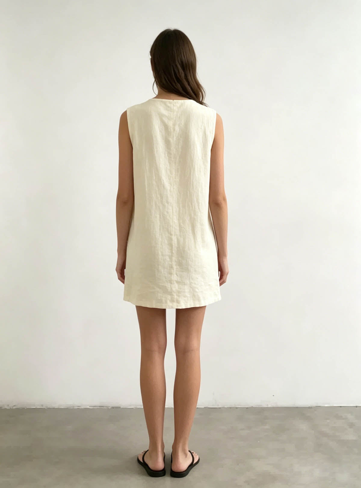 Back full view Haideyu custom fit cream sleeveless straight mini dress plain clean back design minimalist neutral tone custom women dress