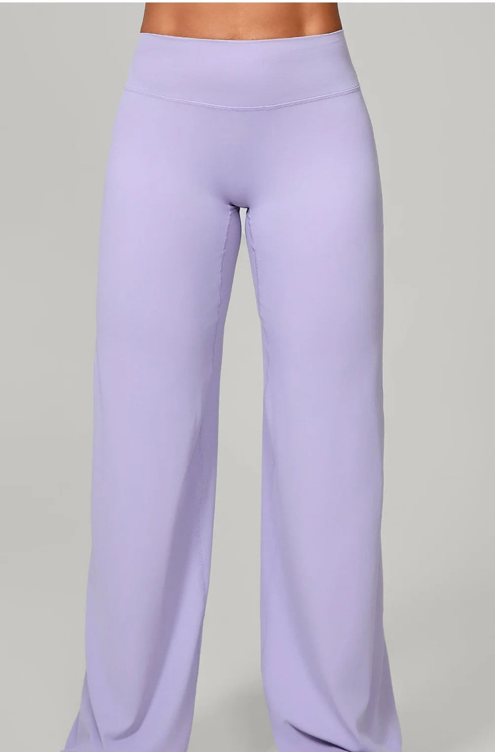 Lilac stretch flared workout trousers full-length street outfit view,custom bulk manufacturing blank activewear