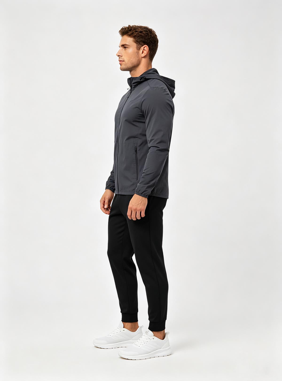 Left side profile view of Haideyu custom men fleece zip hoodie jogger set, European male model OEM tailor-made training apparel production
