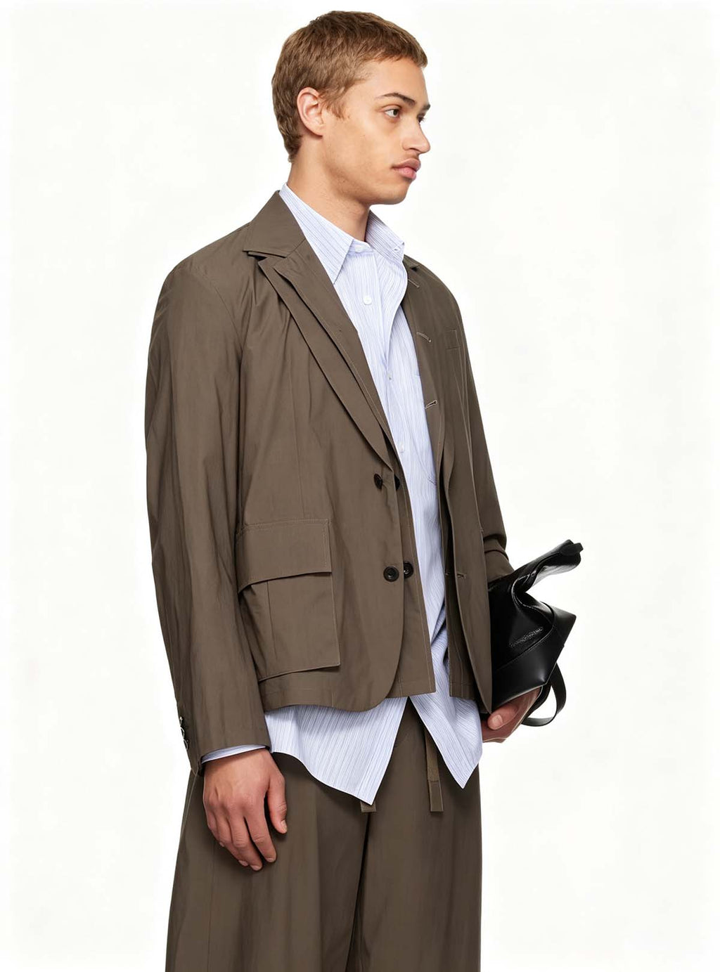Haideyu structured loose brown men’s suit left profile, ODM OEM FOB tailoring service