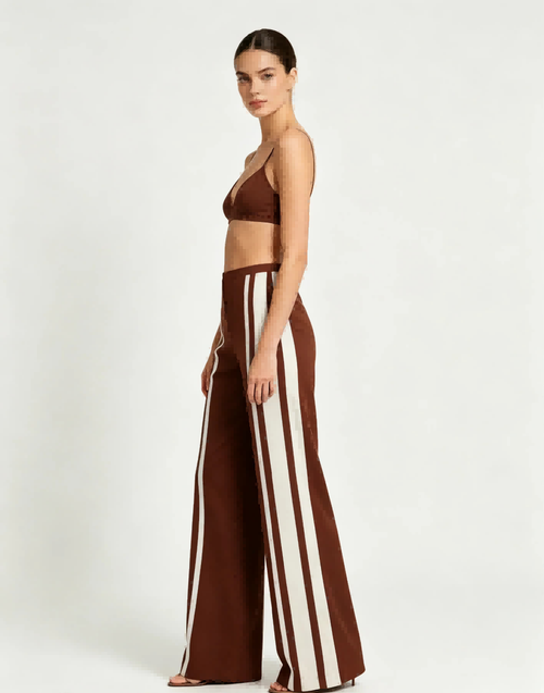 Side profile full shot Haideyu personalized brown side stripe flare sports pants elastic hidden waist loose stretch casual custom women apparel