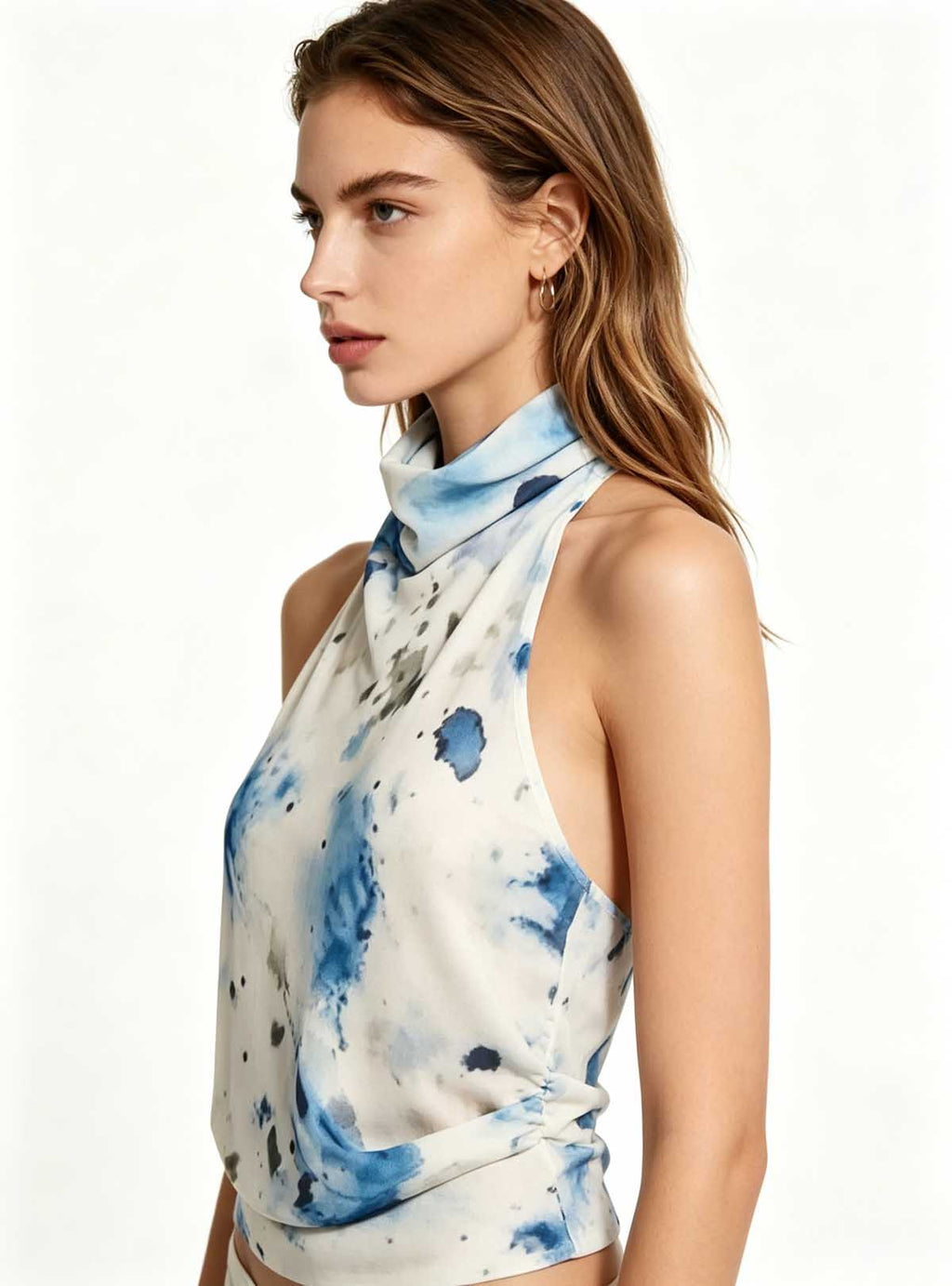 Side profile bust shot Haideyu personalized blue ink splash halter crop top draped cowl neck open back stretch custom women apparel