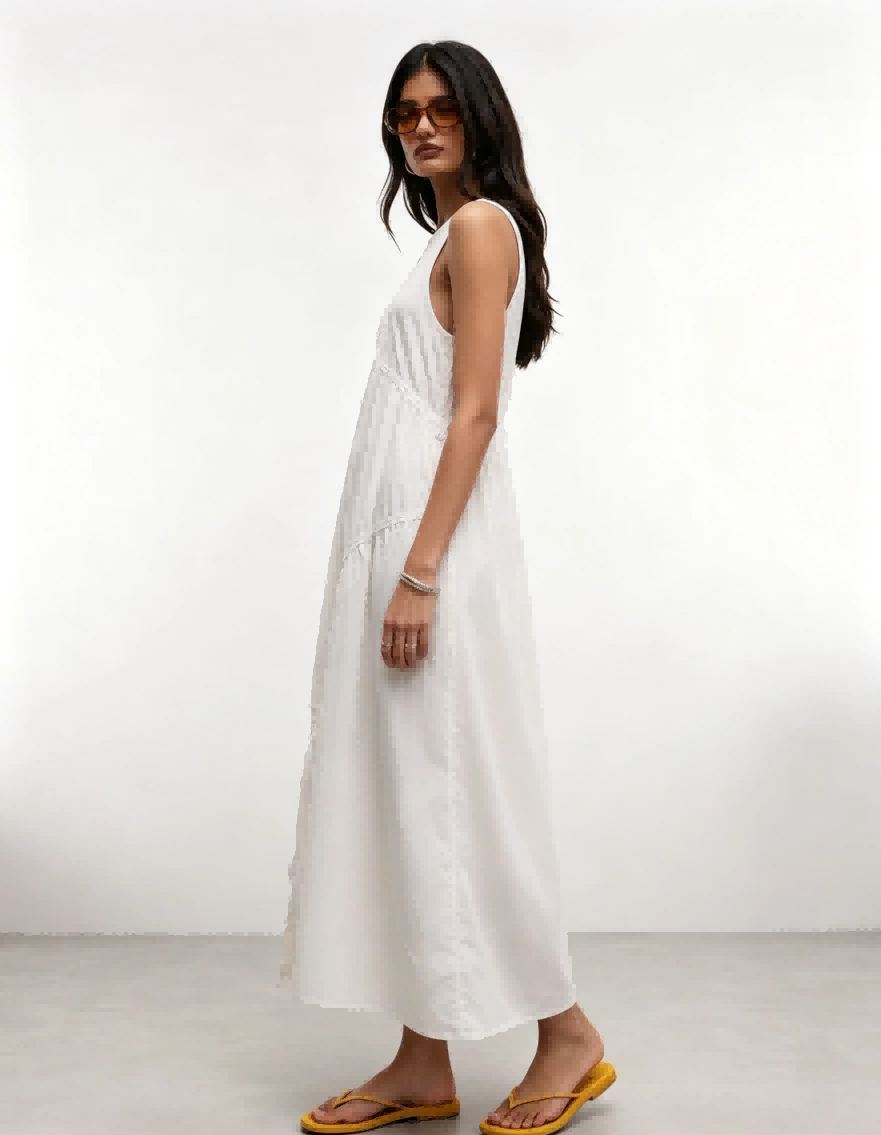 Haideyu OEM custom white sleeveless tiered flowy midi dress side full body shot lightweight textured fabric women casual summer dress