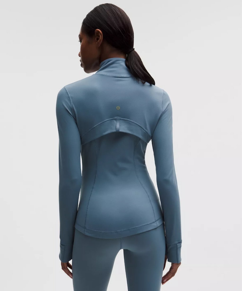 Haideyu custom women zip up yoga jacket back view, tailored seaming slim athletic coat with stand collar, wholesale private label activewear outerwear on haideyu.com