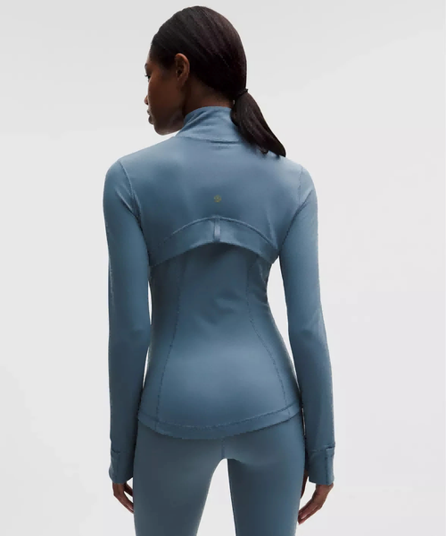 Haideyu custom women zip up yoga jacket back view, tailored seaming slim athletic coat with stand collar, custom manufacturing private label activewear outerwear on haideyu.com