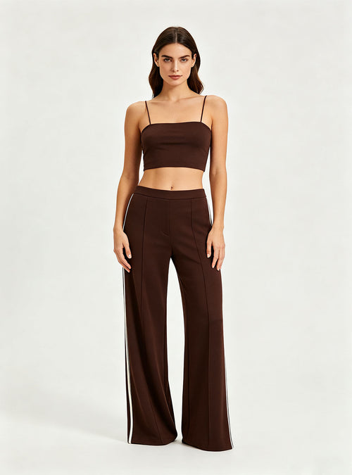 Straight full front view Haideyu private label brown knit flare pants vertical white side stripe floor length everyday custom sportswear