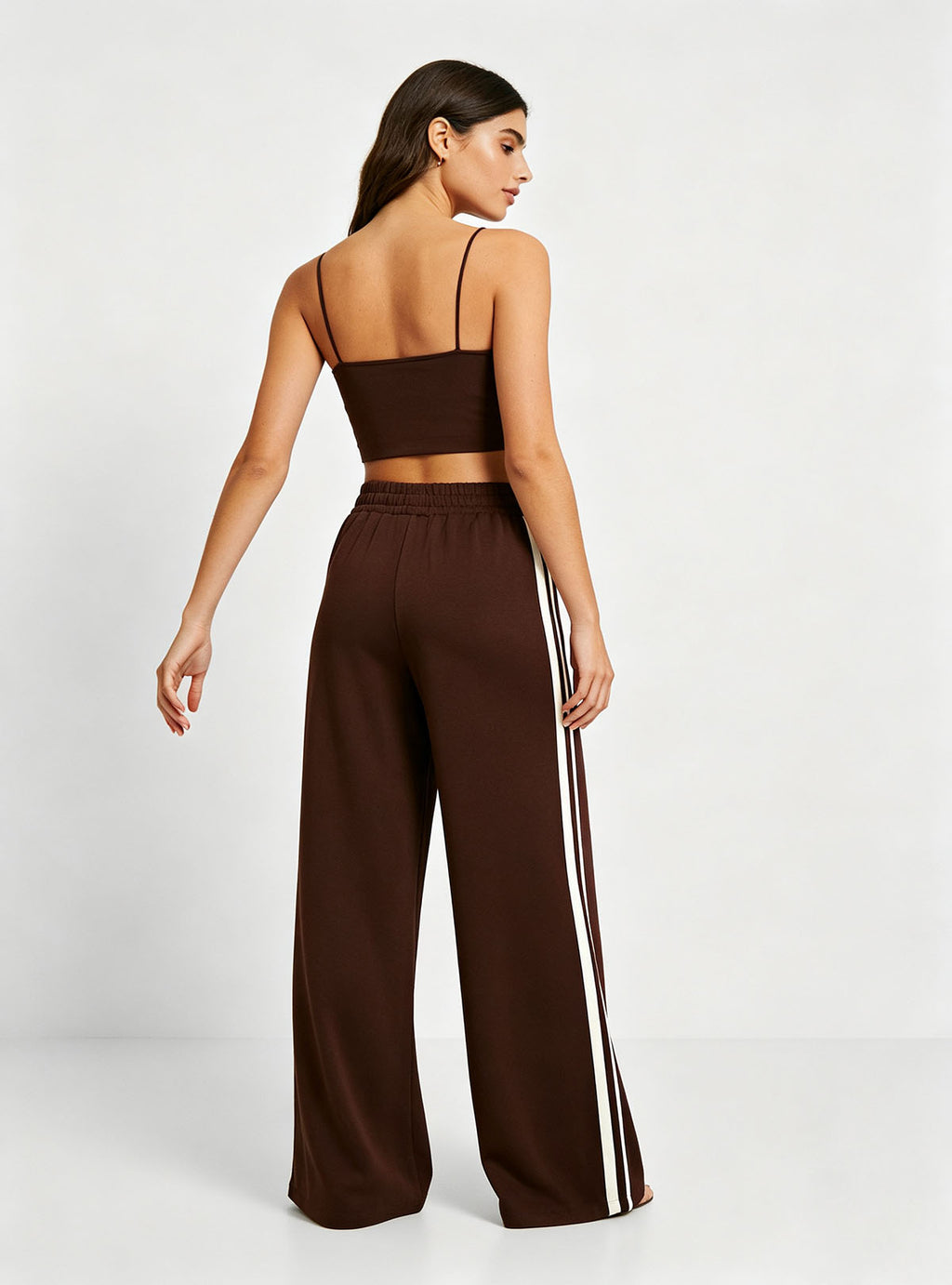 Haideyu women two‑piece matching set, brown crop camisole top and striped wide‑leg pants, white studio background back view, ladies custom clothing ODM supplier