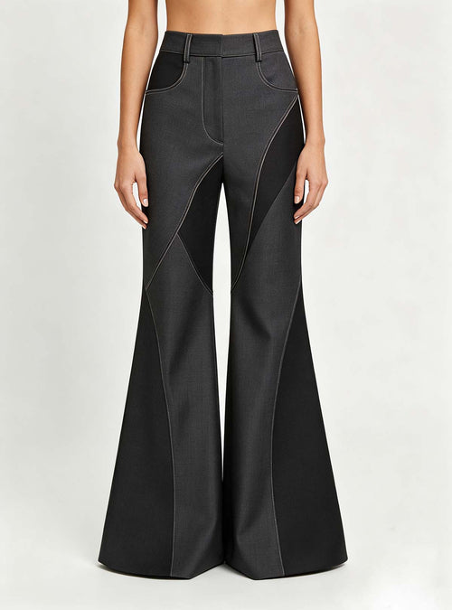 Custom OEM women high‑waist color‑block spliced large flared bell‑bottom pants, front full‑body studio shot