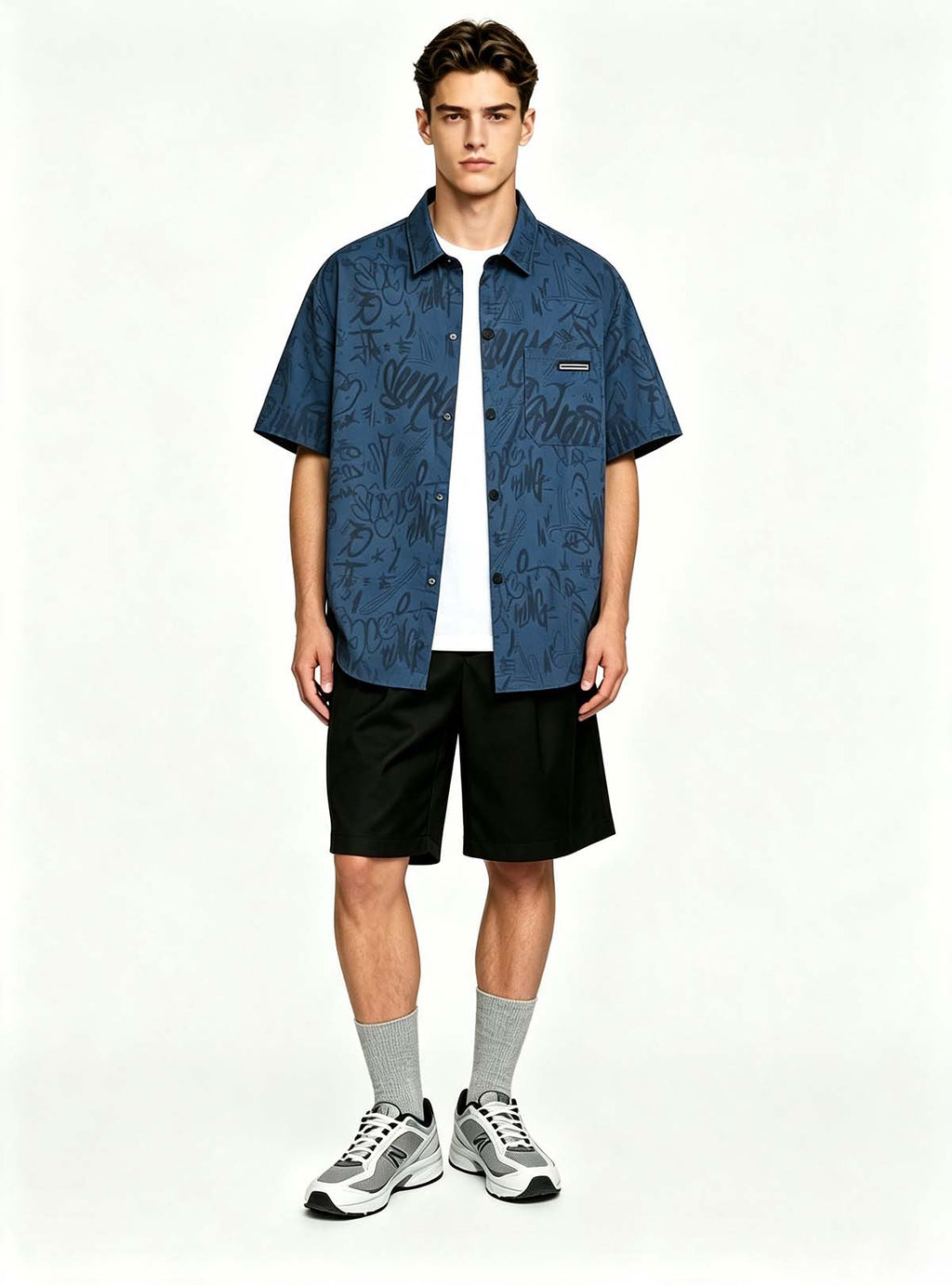 Haideyu men casual navy blue graffiti printed short sleeve shirt, relaxed button‑down top, handsome male‑model studio shot on solid white backdrop