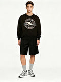 Haideyu men black crewneck sweatshirt and shorts matching set, custom vintage graphic print outfit, handsome male model studio shot solid white background