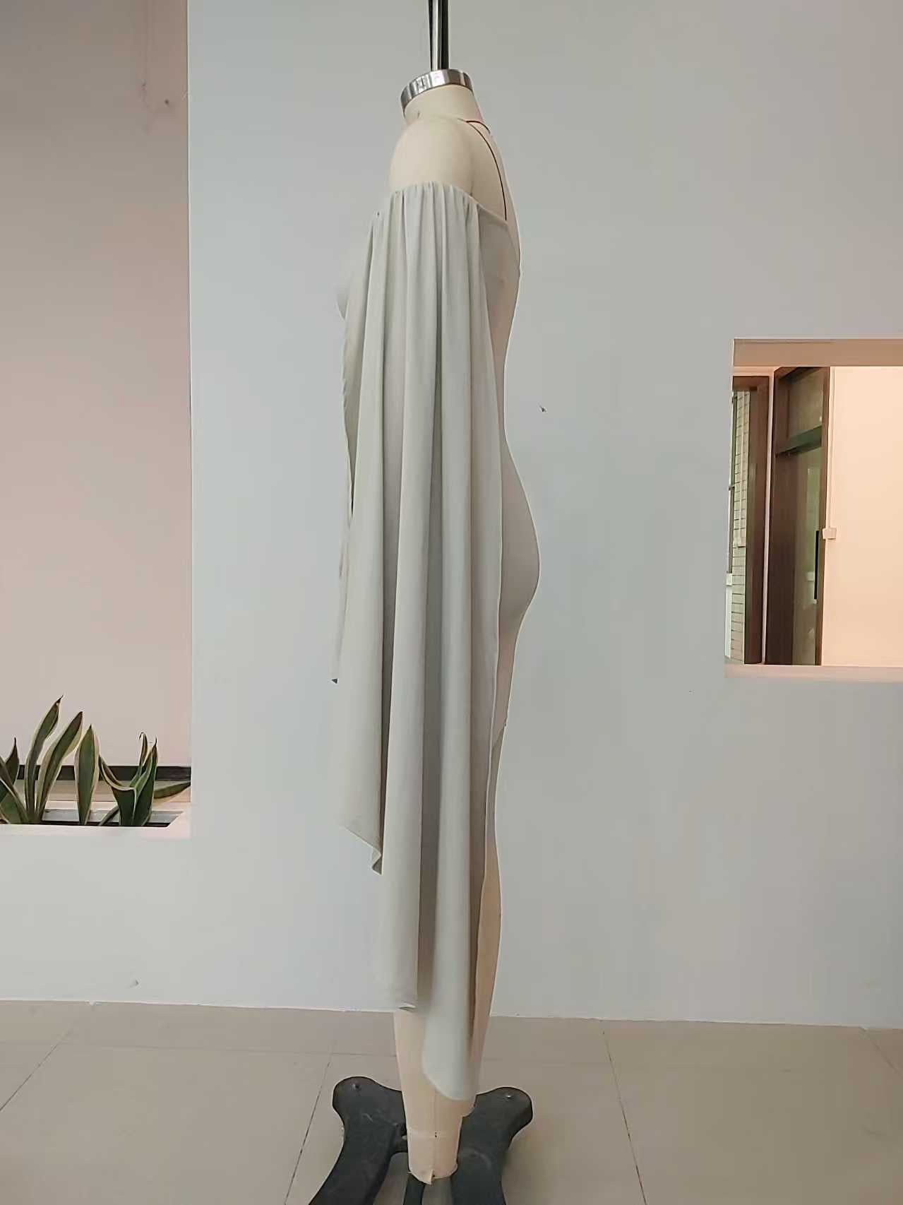 hdfish side view of draped off-shoulder gray mini dress, flowy sleeve detail