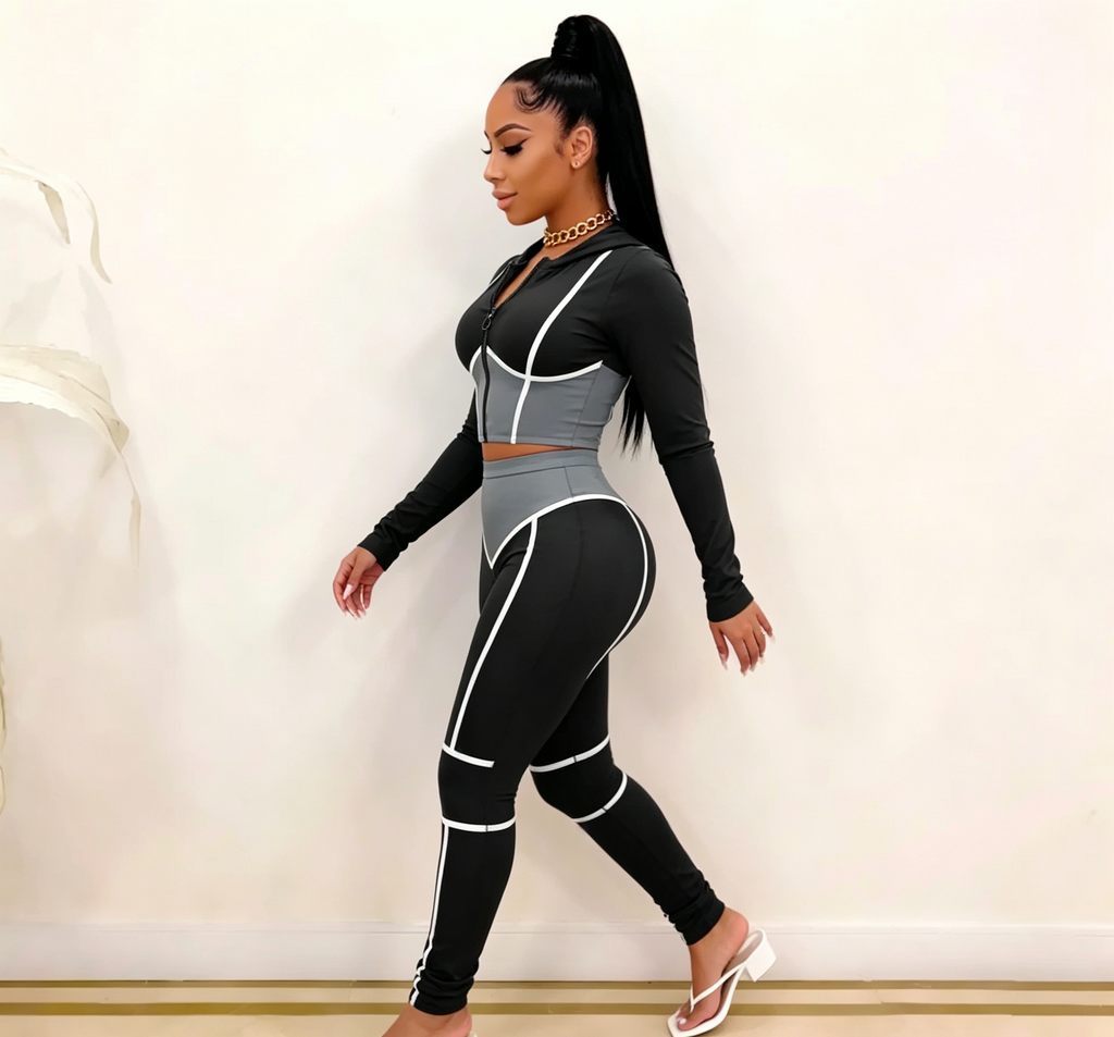 hdfish corset-inspired black and gray athletic outfit, featuring white contrast piping, cropped zip jacket and matching leggings